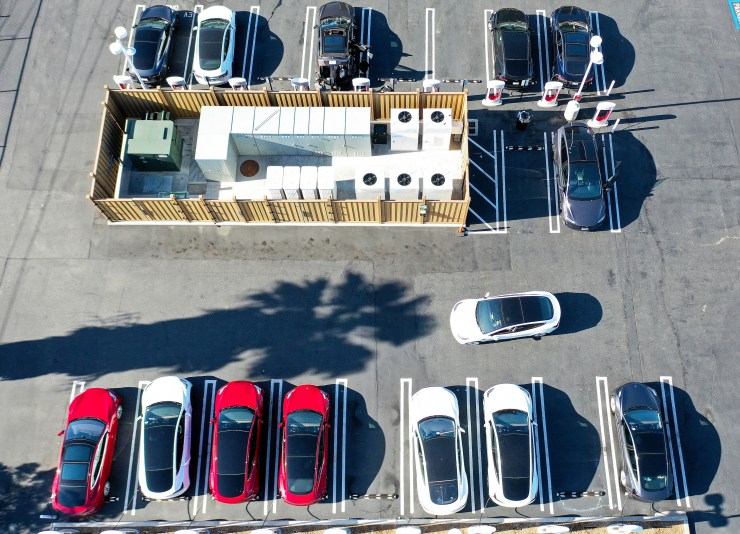 Aerial shot of an electric vehicle charging station.