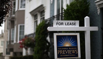 A for lease sign is seen in front of a home.