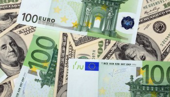 $100 bills and euro banknotes.