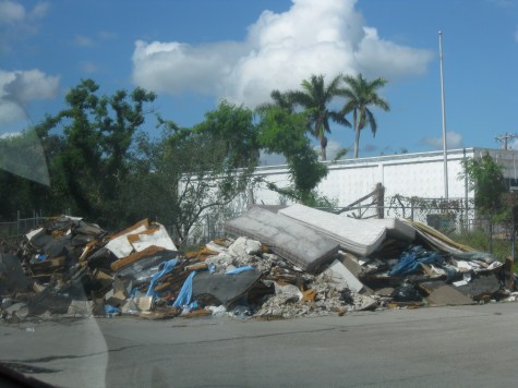 A pile or rubble remains where mobile homes once stood. 