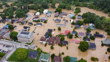 Aerial view of homes submerged under floodwaters in Kentucky.