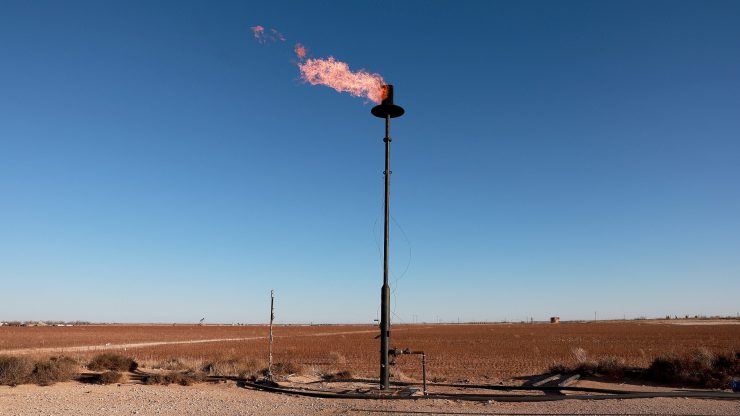 Natural gas is flared off during an oil drilling operation in the Permian Basin oil field.