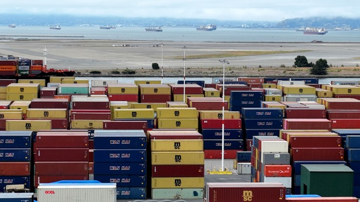 An aerial view of shipping containers sitting idle at the Port of Oakland in California.