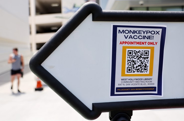 A sign directs people toward a pop-up monkeypox vaccination clinic in West Hollywood, California.