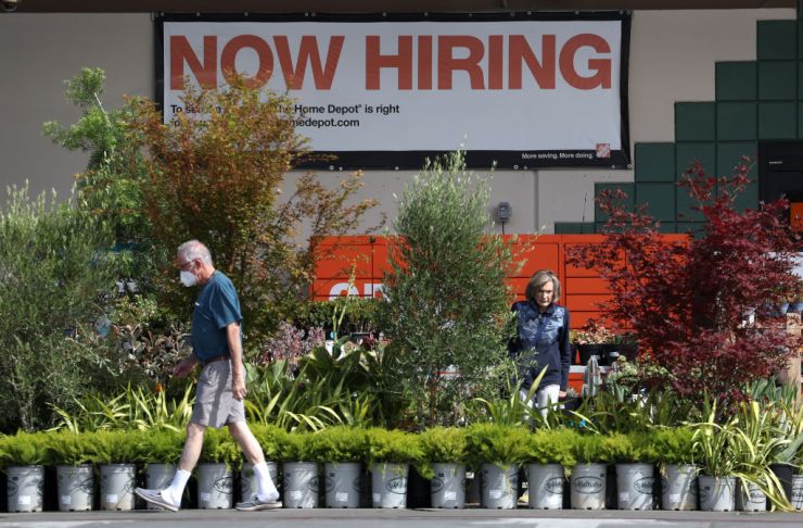 A "now hiring" sign at a Home Depot