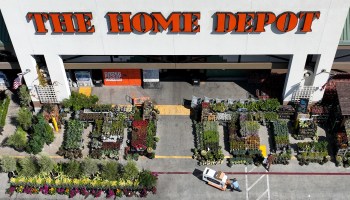 In an aerial view, a customer is seen entering a Hone Depot store in San Rafael, California.