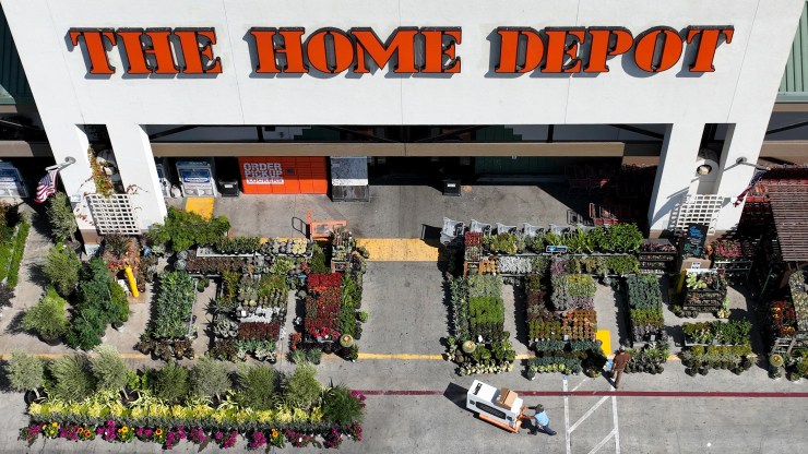 In an aerial view, a customer is seen entering a Hone Depot store in San Rafael, California.