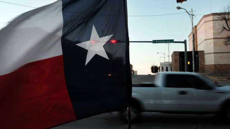 The Texas flag flies in downtown Sweetwater on January 19, 2016 in Sweetwater, Texas.