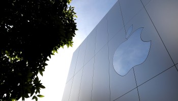 The Apple logo is displayed on the exterior of an Apple Store on February 1, 2018 in San Francisco, California.