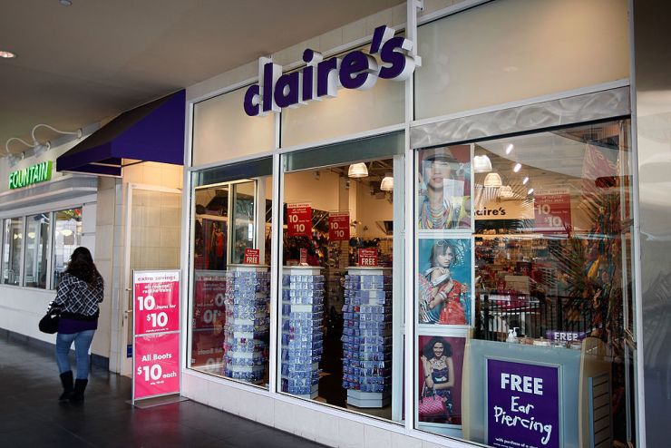People walk by a Claire's store in Los Angeles in 2010.