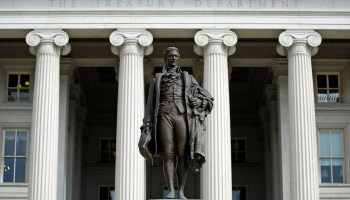 A statue of the first United States Secretary of the Treasury Alexander Hamilton stands in front of the U.S. Treasury. If you've ever wondered where corporate fines go, they usually head here.