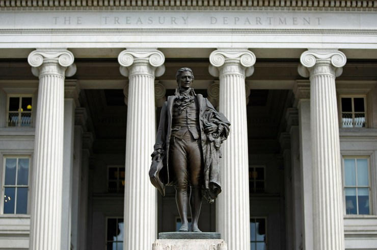 A statue of the first United States Secretary of the Treasury Alexander Hamilton stands in front of the U.S. Treasury. If you've ever wondered where corporate fines go, they usually head here.
