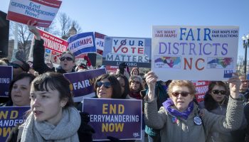 Protesters attends a rally for "Fair Maps" on March 26, 2019 in Washington, DC. The rally was part of the Supreme Court hearings in landmark redistricting cases out of North Carolina and Maryland (Photo by Tasos Katopodis/Getty Images)