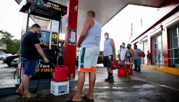 People wait in line at a gas station in Cabo Rojo, Puerto Rico.