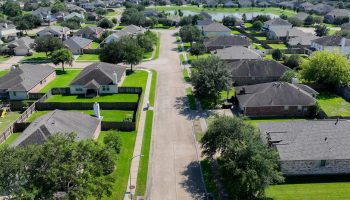 In an aerial view, homes are seen in a residential neighborhood on September 15, 2022 in Pearland, Texas. Mortgage rates continue climbing around the country as the housing market reached 6% this week, marking the first time since the 2008 financial crisis. (Photo by Brandon Bell/Getty Images)