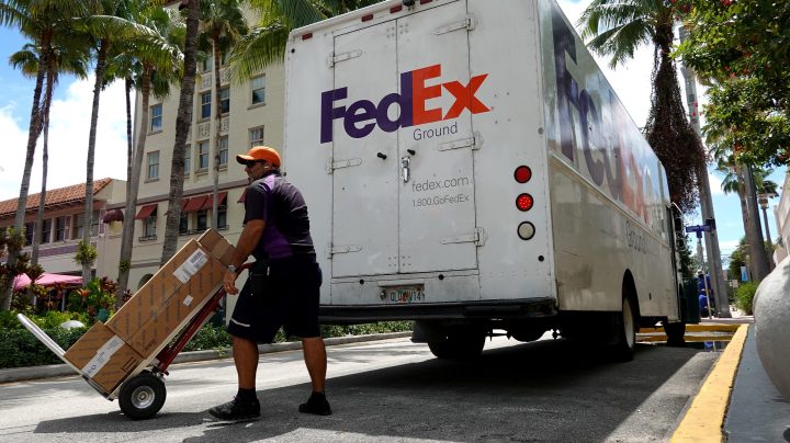Fedex says shipping volume is down - Marketplace