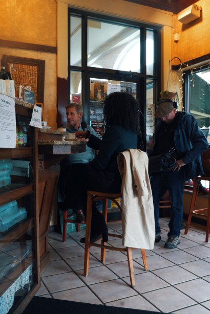 Marketplace host Kai Ryssdal talks with Nela Richardson, ADP’s chief economist, at a coffee shop in Buffalo, New York