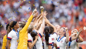 Players of the USA celebrate with the FIFA Women's World Cup Trophy following team's victory in the 2019 FIFA Women's World Cup France Final match between The United States of America and The Netherlands at Stade de Lyon on July 07, 2019 in Lyon, France.