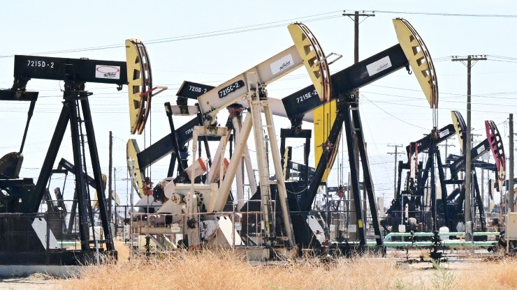 This picture taken on September 28, 2022 shows oil pumpjacks along a section of Highway 33 known as the Petroleum Highway north of McKittrick in Kern County, California.