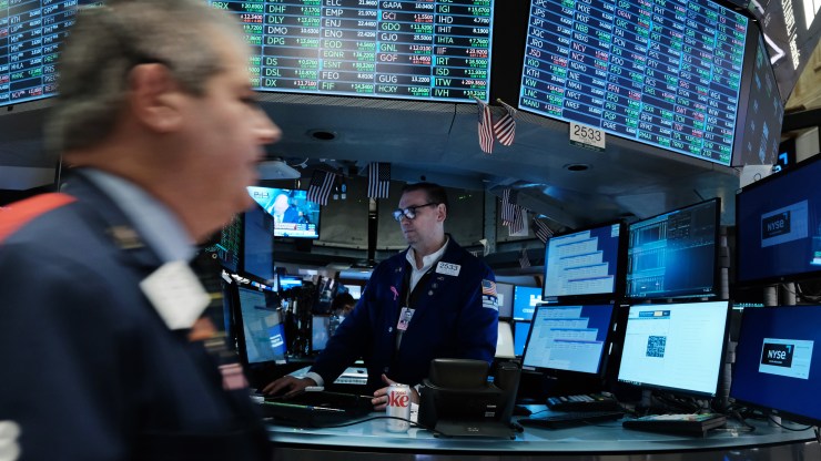 Traders work on the floor of the New York Stock Exchange on Oct. 27.