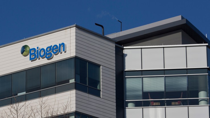 A sign for biotechnology company, Biogen, Inc. is seen on a building in Cambridge, Massachusetts, on March 18, 2017.