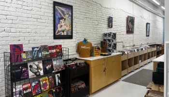 Shelving full of comic books and records line the wall at Phillip Rollins' new OffBeat location in Jackson, Mississippi.