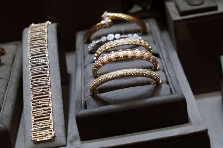 Gold jewelry is displayed in a window of a store in Manhattan's jewelry district in New York City.