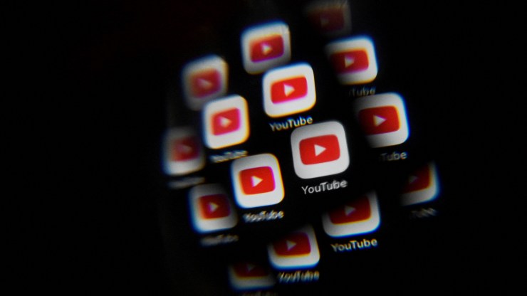 YouTube logos on a smartphone screen.