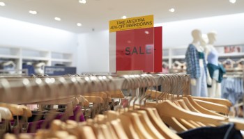 A clearance sale sign is seen at a Gap retail store.