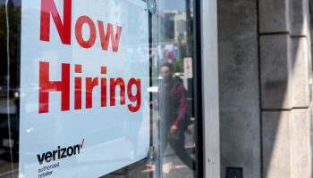 LOS ANGELES, CALIFORNIA - JULY 26: A 'Now Hiring' sign is posted at a Verizon store on July 26, 2022 in Los Angeles, California. As the Federal Reserve continues to increase interest rates, the labor market is starting to show signs of slowing down. (Photo by Mario Tama/Getty Images)