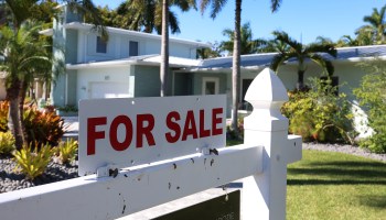 A For Sale sign at a single-family home in Florida.