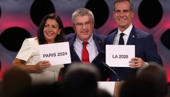 Paris Mayor Anne Hidalgo, IOC President Thomas Bach and Los Angeles Mayor Eric Garcetti are pictured in 2017, when Paris was confirmed as Olympic host in 2024 and Los Angeles in 2028.