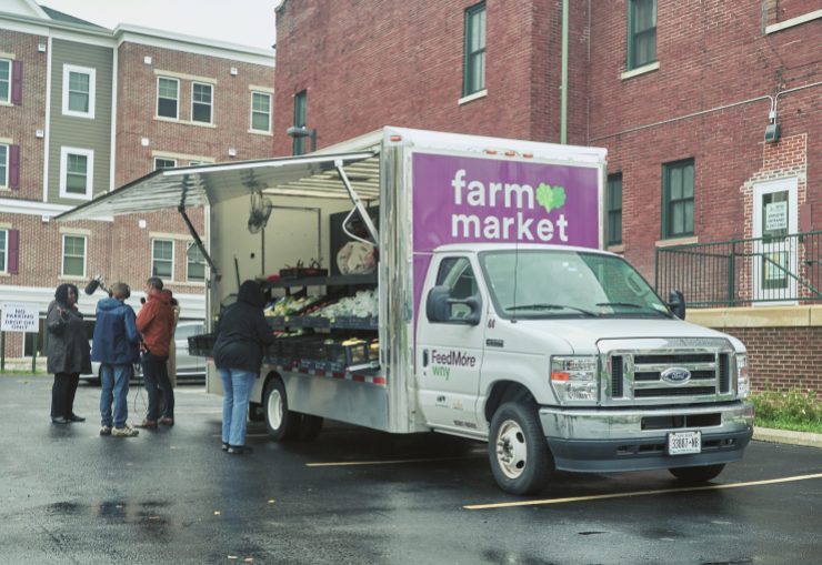 The Farm Market truck operated by FeedMore WNY parks outside Westminster Commons, an affordable housing complex for seniors in east Buffalo.