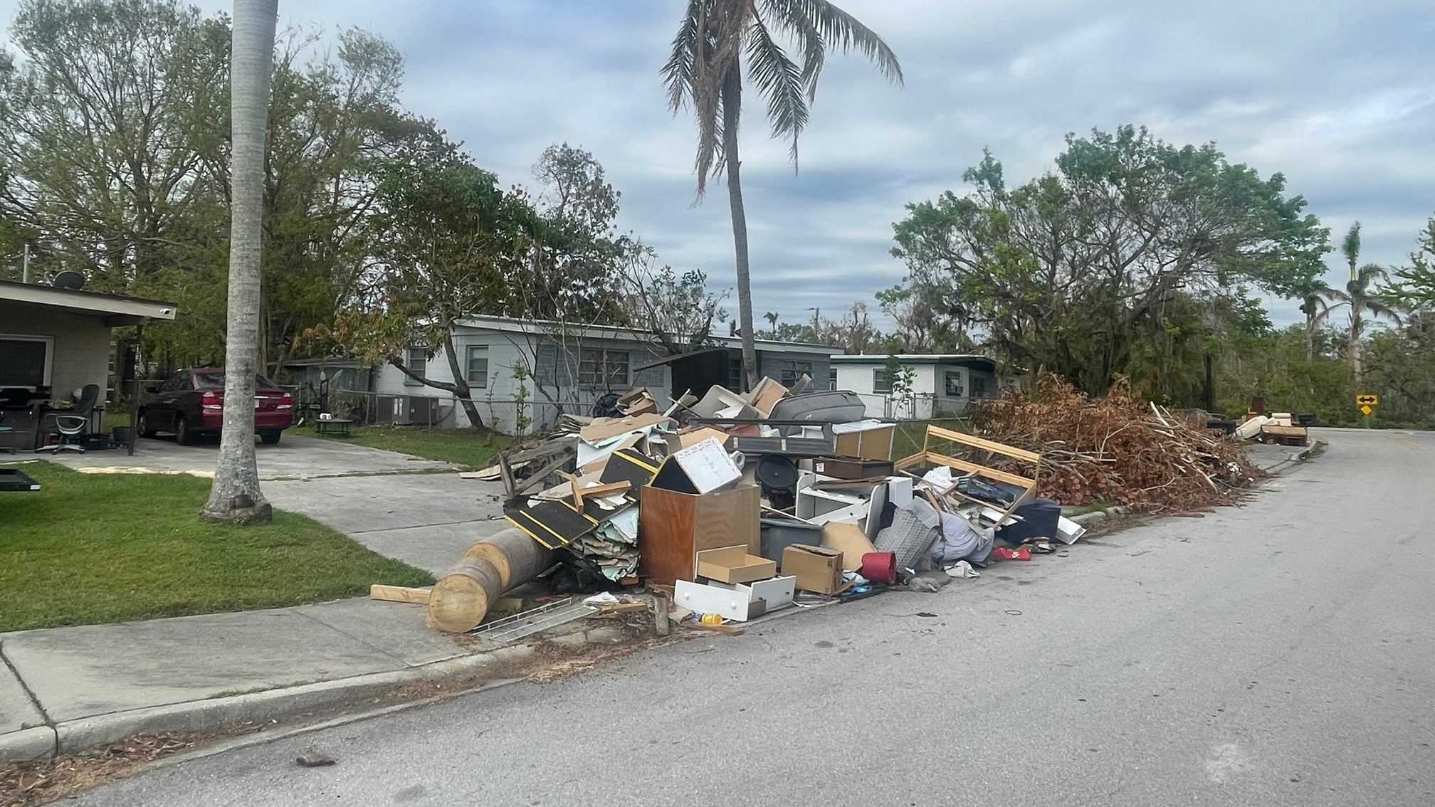 https://www.marketplace.org/wp-content/uploads/2022/11/fort-myers-street-homes-with-debris-e1669153142295.jpg?fit=2016%2C1134