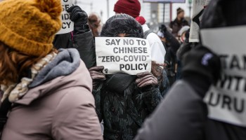Demonstrators protest in front of the Chinese Embassy in solidarity with protesters in China on December 3, 2022 in Berlin, Germany.