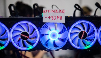 An ethereum mining rig is on display at the Thailand Crypto Expo 2022. Ethereum moved away from mining processes that require high energy use of graphics cards to a low energy, "Proof of Stake" model in September 2022.