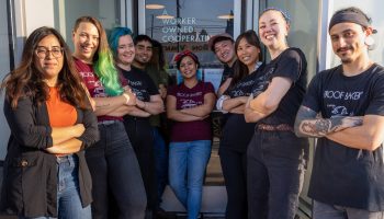 The full staff of Proof Bakery is seen after the business became a worker cooperative.