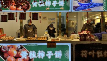Food vendors at the Muslim quarter in Xi'an seem bored without customers in late December 2022. That was when COVID infections swept across China.