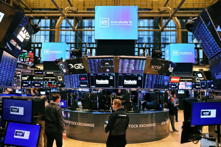 Traders working on the floor of the New York Stock Exchange during morning trading.