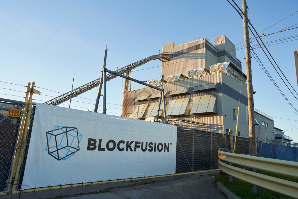 A sign hangs on the fence outside the Blockfusion facility in Niagara Falls, New York on October 24, 2022.