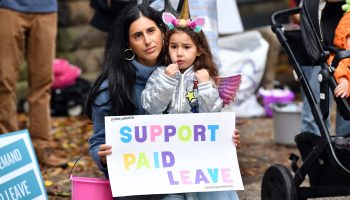 NYC families attend the NYC For Paid Leave Rally at Grand Army Plaza on October 31, 2021 in Brooklyn, New York.