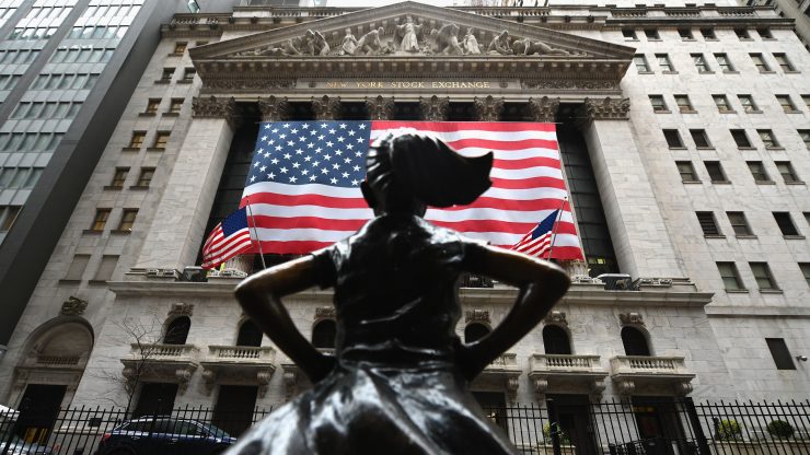 The Fearless Girl statue stands in front of the New York Stock Exchange near Wall Street on March 23, 2020