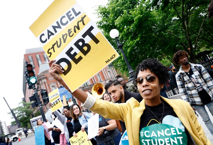 Student loan borrowers are gathered near The White House at the beginning of the pandemic, telling President Joe Biden to cancel student debt.