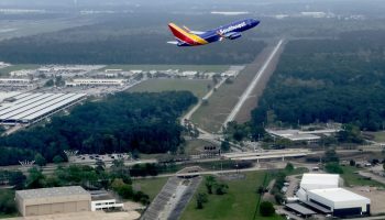 A Southwest commercial airplane taking off near George Bush International Airport in Texas.