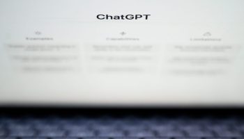The homepage for OpenAi's ChatGPT is displayed on a laptop screen.