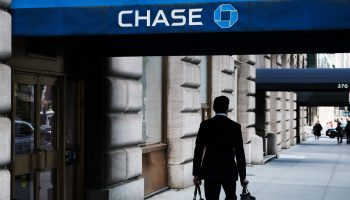 A man walks past a canopy with the blue and white Chase bank branch logo on it in Manhattan on May 01, 2023 in New York City.