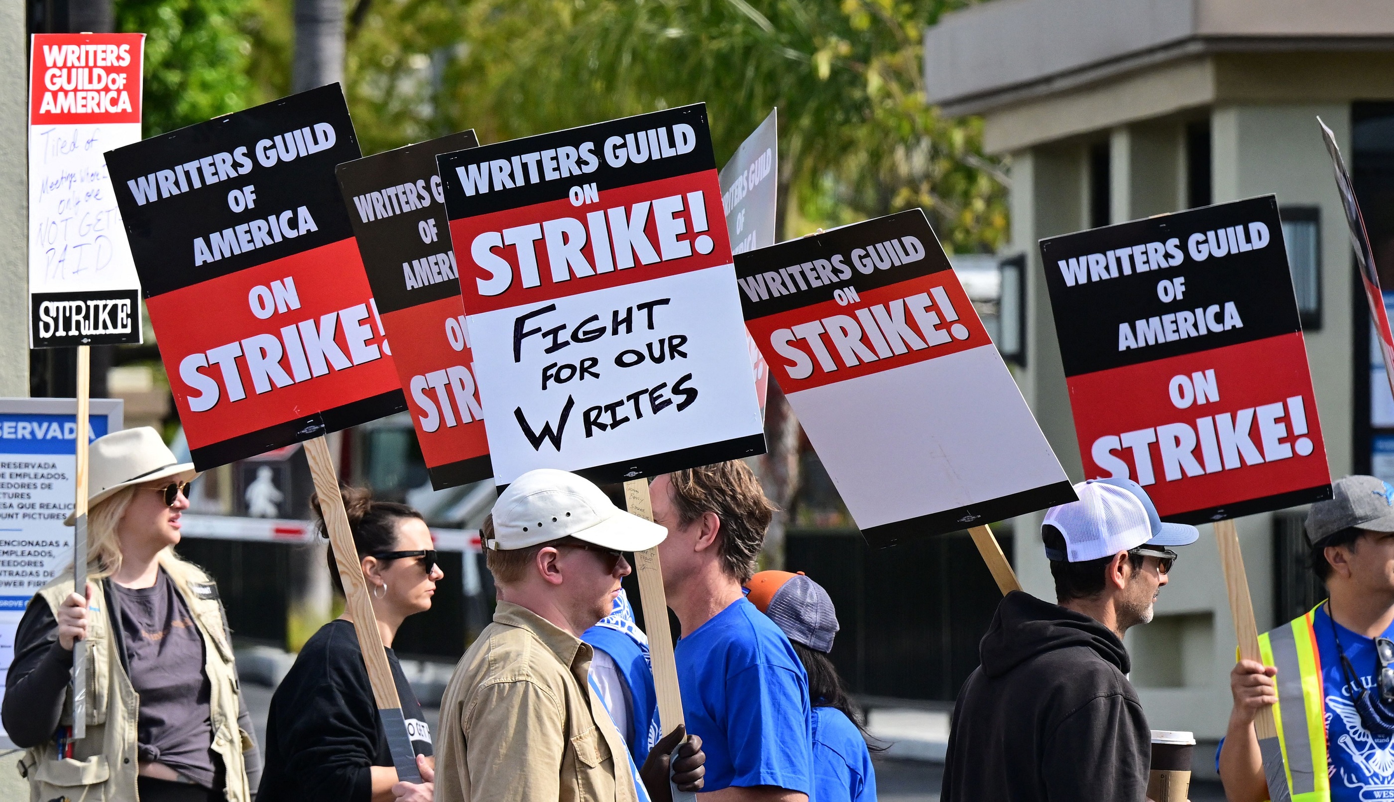 WGA Strike: Union Estimates How Much a Deal Would Cost – The Hollywood  Reporter